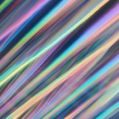 An abstract image featuring diagonal stripes of various colors, including shades of blue, pink, purple, green, and yellow from the Temple Kush A Line Multipack (R), creating a dynamic and vibrant appearance.